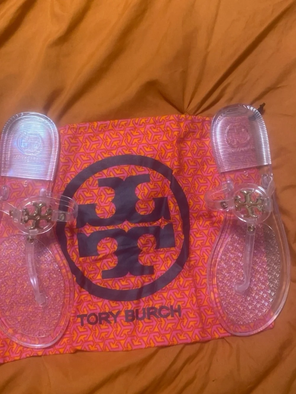 Tory Burch Clear Jelly Thong Sandals with Gold Logo Medallions